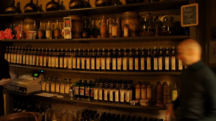 Hans among the many (antique) bottles at Wynand Fockink.