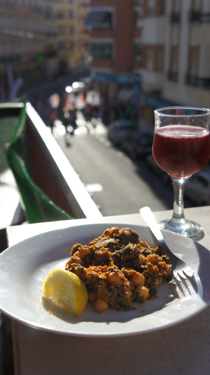 A little tapas on the balcony and a protest down the street.